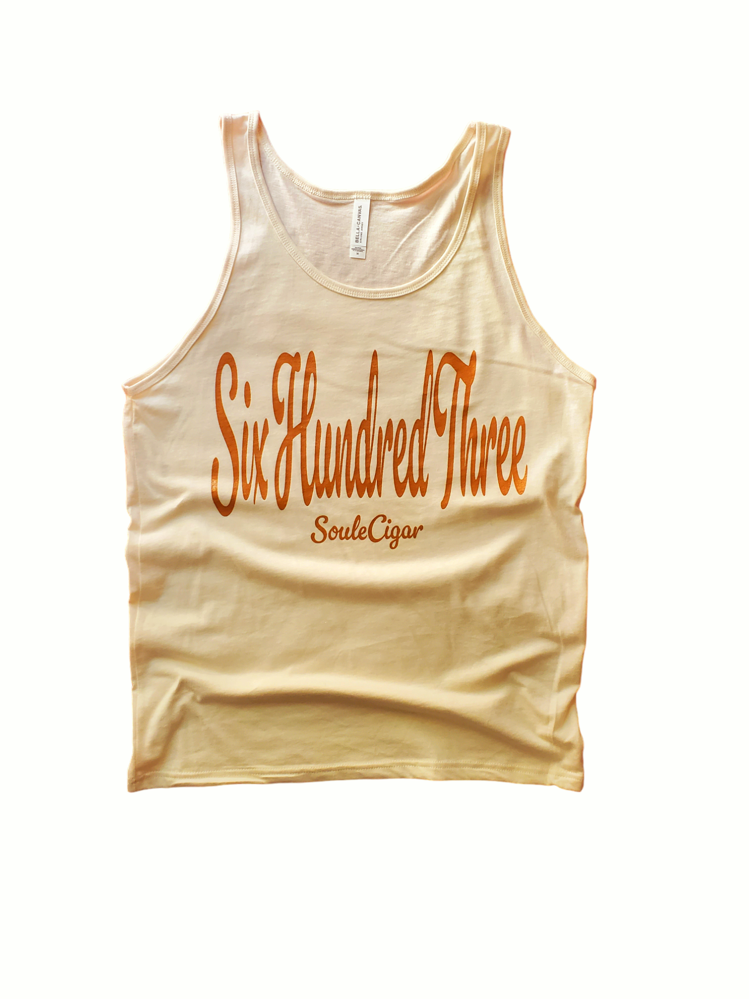 A beige tank top with 'Six Hundred Three' and other text printed in Light Brown on the front.